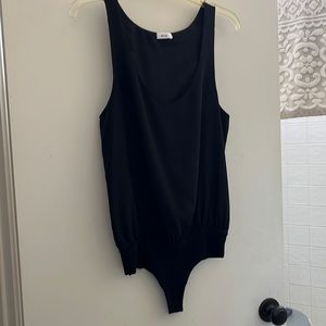 Soft and beautiful silk material stretch black perfect condition worn once.